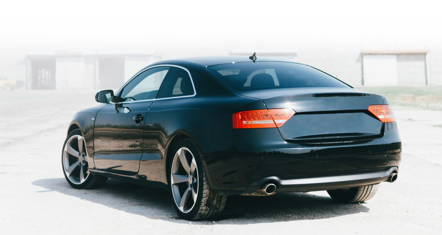 black luxury car inspected by Q2 Management