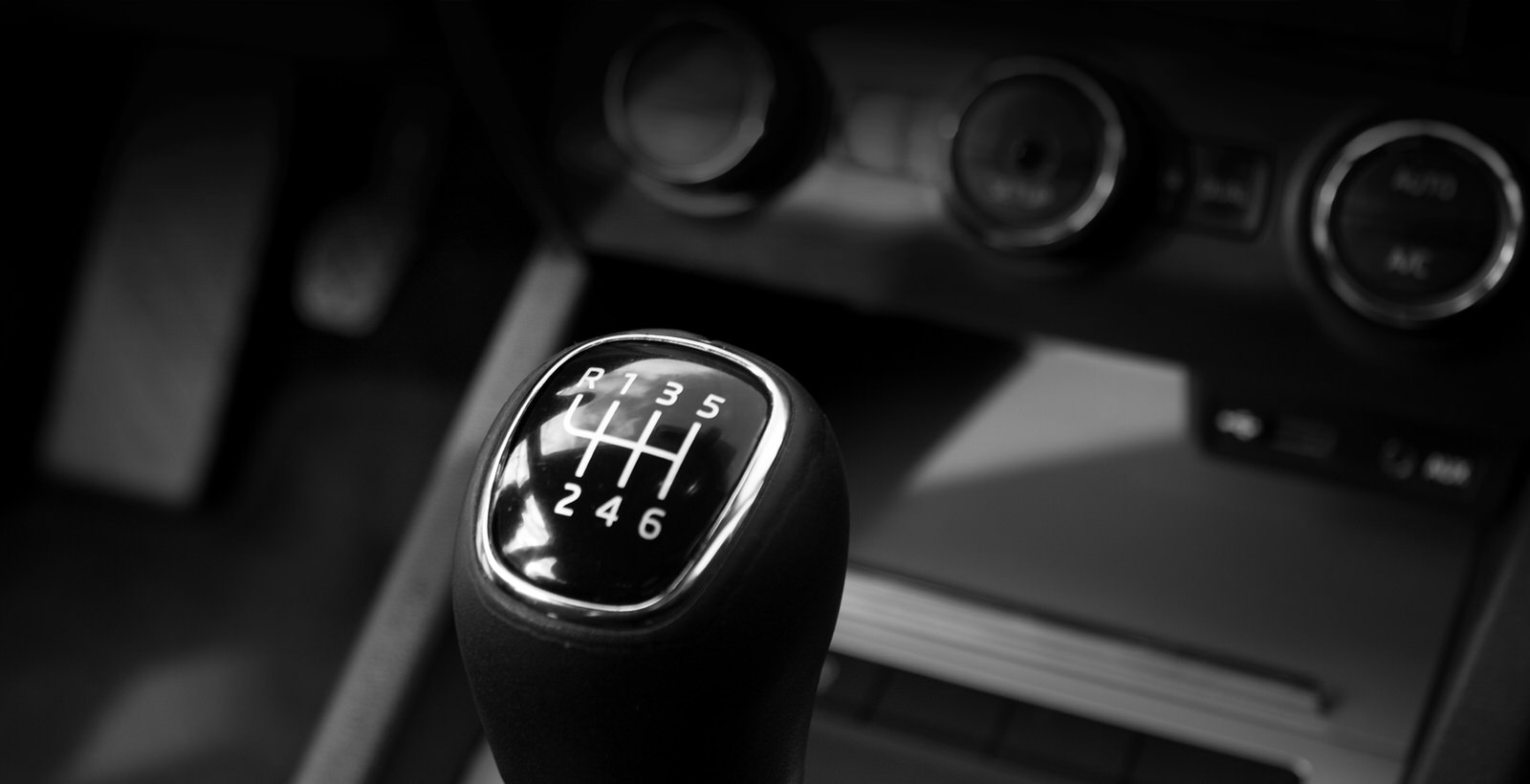 black gearshift inspected by Q2 Management Inc.